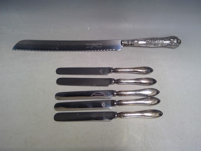 Lot 29 - A Silver Handle Bread Knife and Five Silver...