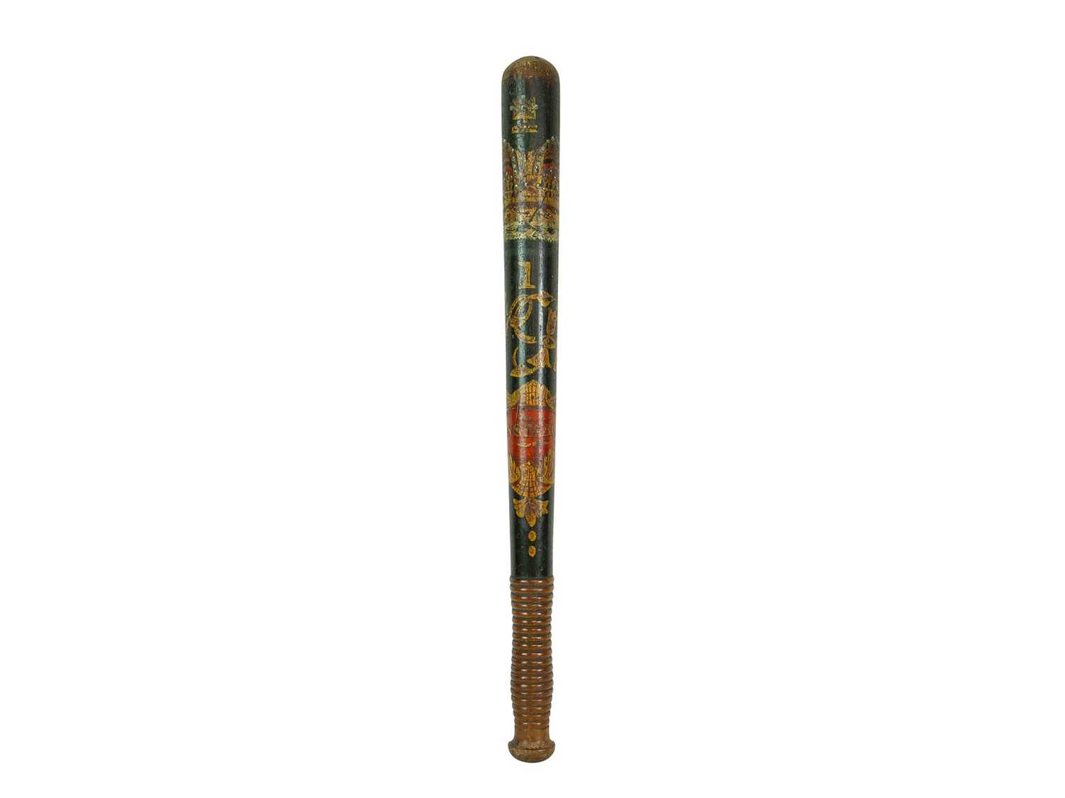 Lot 42 - A Victorian ebonised walnut police truncheon with ribbed grip.