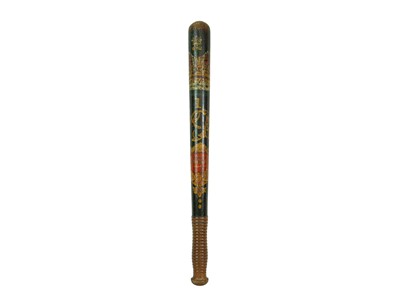 Lot 42 - A Victorian ebonised walnut police truncheon with ribbed grip.