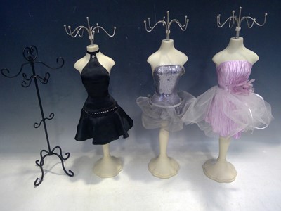 Lot 75 - Four Jewellery Hangers. The Hangers are 46cm...