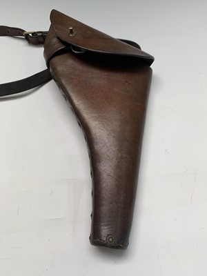 Lot 355 - A WW2 tan leather army holster and strap,...