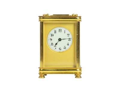 Lot 801 - An early 20th century French lacquered brass carriage timepiece.
