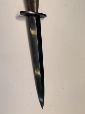 Lot 357 - An FS fighting knife, with blued steel blade...