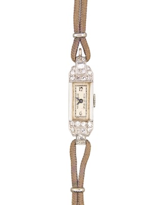 Lot 197 - An Art Deco Swiss platinum with gold, diamond-set cocktail watch/pendant.