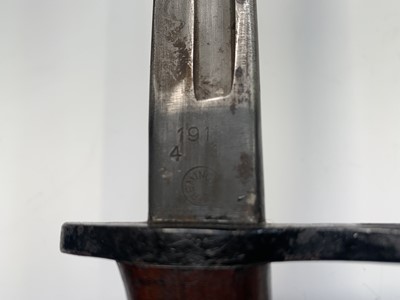 Lot 358 - A US Remington 1913 pattern bayonet, with two...