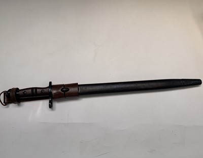 Lot 358 - A US Remington 1913 pattern bayonet, with two...