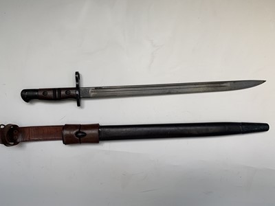 Lot 358 - A US Remington 1913 pattern bayonet, with two...