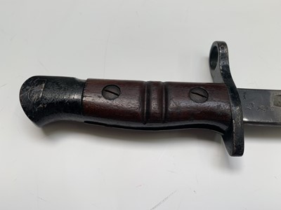 Lot 358 - A US Remington 1913 pattern bayonet, with two...