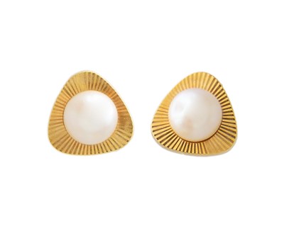 Lot 49 - A pair of 18k gold pearl set stud earrings.