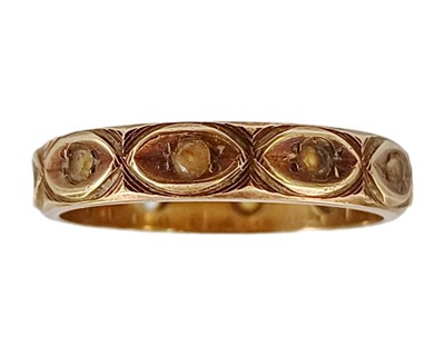 Lot 2 - A 9k gold white stone set full eternity band ring.
