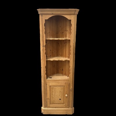 Lot 86 - A pine open-fronted corner unit 60cm wide and...