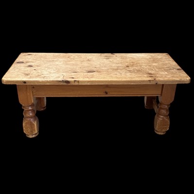 Lot 104 - A solid pine coffee table, 122cm wide, 48cm...