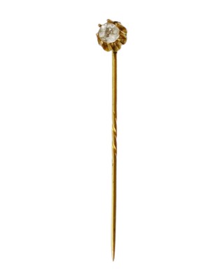Lot 7 - A gold pin, set with a rock crystal, in an antique box.