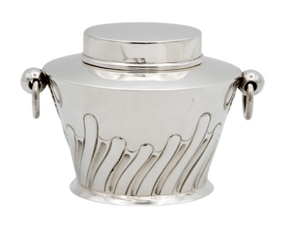 Lot 148 - A George V silver tea caddy with twin ring handles by William Hutton.