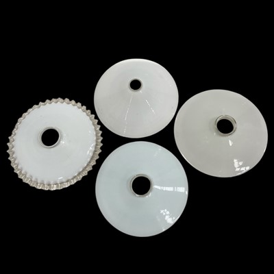 Lot 196 - Four Milk glass lamp shades. 25cm across.