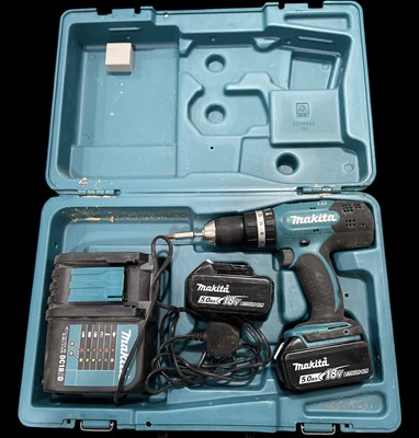 Lot 118 - A Makita 5.0Ah 18V hammer drill, with two...