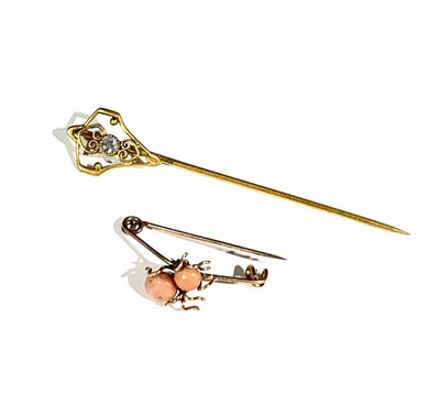 Lot 2474 - A coral and gold spider brooch and a gilt pin...