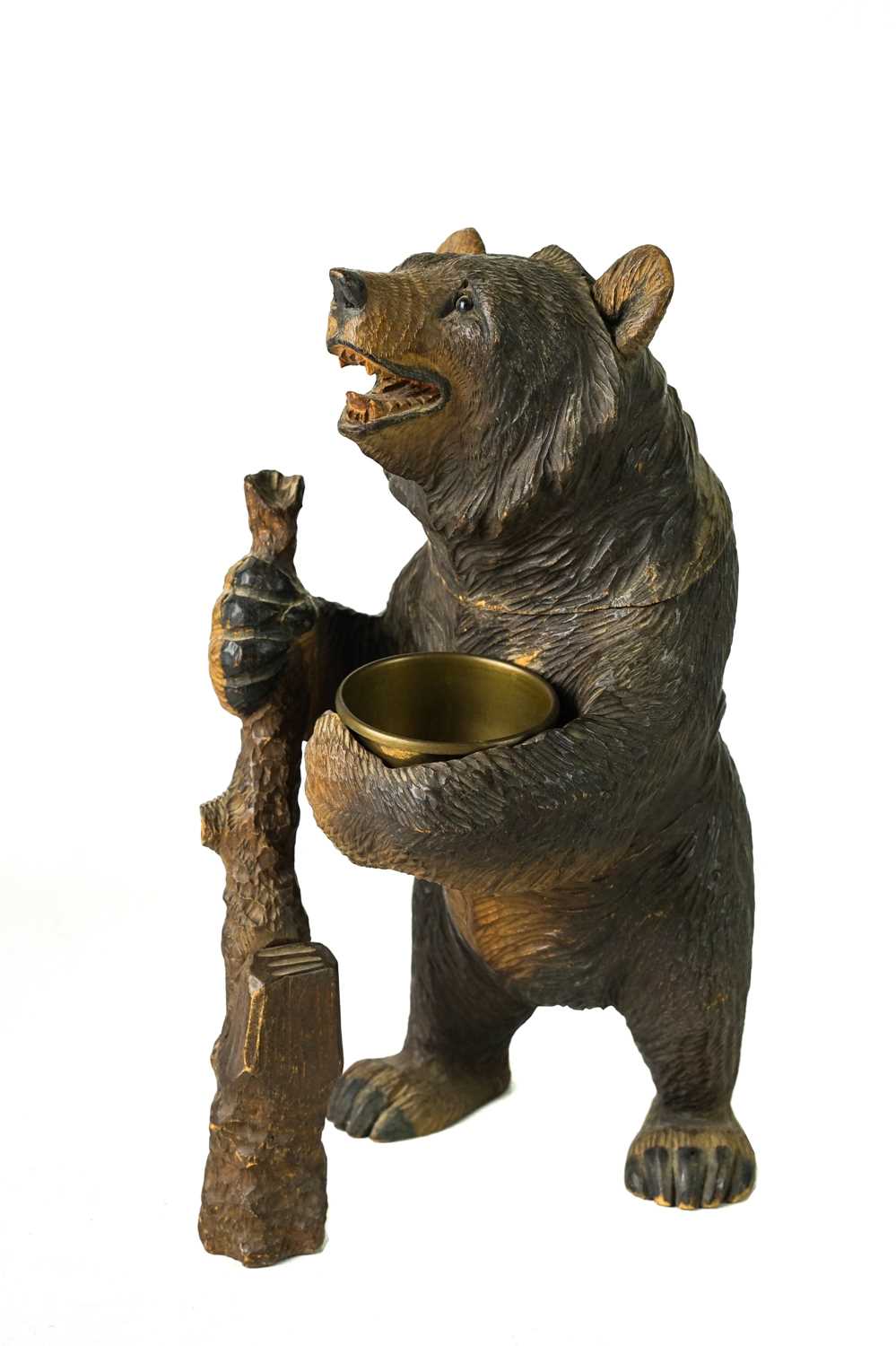 Lot 36 - A Black Forest carved bear tobacco jar.