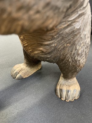 Lot 36 - A Black Forest carved bear tobacco jar.