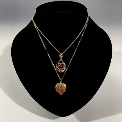 Lot 2440 - A 9ct heart locket and chain, a 9ct pendant...