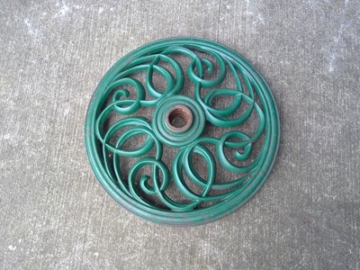 Lot 137 - A Wrought Iron Parasol Base. The Base is 45cm...