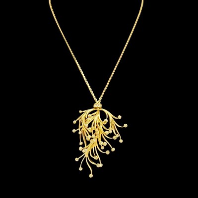 Lot 17 - GROSSE - a gold-tone metal paste set pendant necklace, in an original pouch.