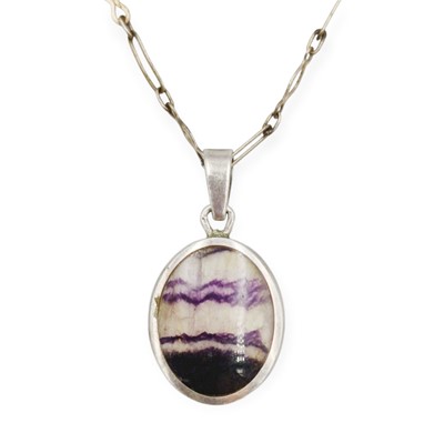 Lot 19 - DAVID SCOTT WALKER - A silver set Blue John pendant necklace.