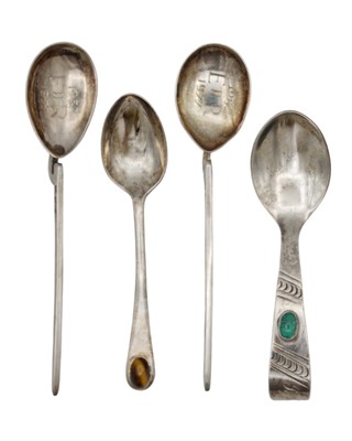 Lot 165 - A pair of QEII silver 'Corinium' spoons, together with two stone set silver spoons.