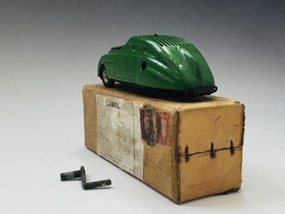 Lot 614 - Tin plate Schuco car. A 'Kommando Anno 2000'...