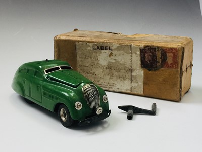 Lot 614 - Tin plate Schuco car. A 'Kommando Anno 2000'...