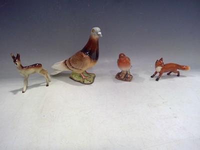 Lot 195 - A Beswick Pigeon, Robin, a Fox and a Fawn.