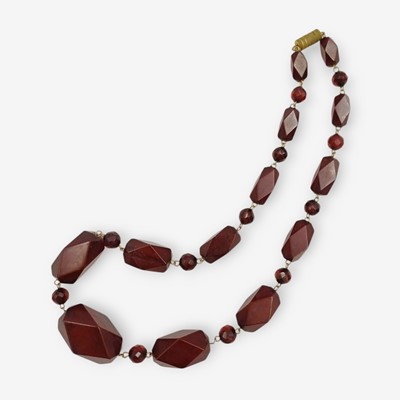 Lot 4 - A cherry amber style faceted bead necklace.