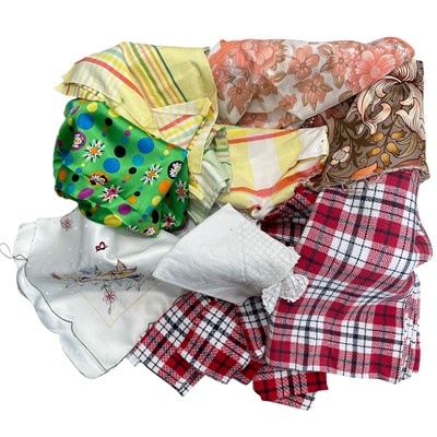 Lot 200 - A box of assorted fabrics, Tablecloths,...