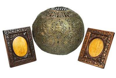 Lot 426 - An Islamic brass spherical mosque lamp shade.