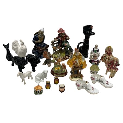 Lot 20 - A collection of figurines, including the...
