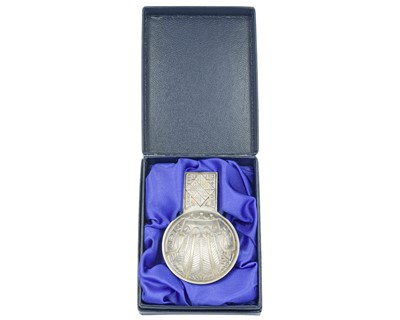 Lot 17 - A 20th century silver commemorative caddy spoon by A.G. Styles for Garrard and Company.