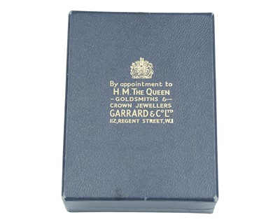 Lot 17 - A 20th century silver commemorative caddy spoon by A.G. Styles for Garrard and Company.