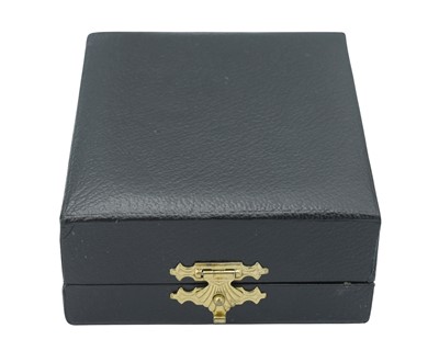 Lot 3 - A modern silver caddy spoon by Stuart Devlin.