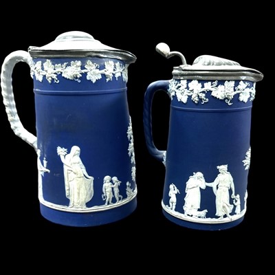 Lot 53 - Two Wedgwood Jasperware lidded jugs, the...