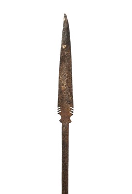 Lot 217 - An African barbed iron spear.
