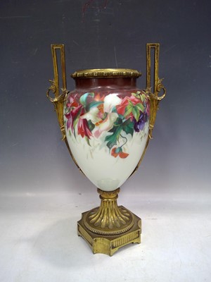 Lot 10 - A Victorian opaque glass and brass oil lamp...