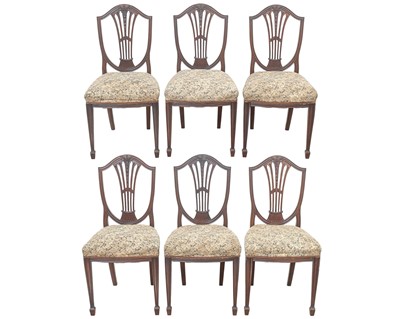 Lot 901 - A set of six Sheraton style mahogany dining chairs.
