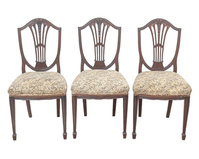 Lot 901 - A set of six Sheraton style mahogany dining chairs.