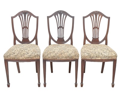 Lot 901 - A set of six Sheraton style mahogany dining chairs.