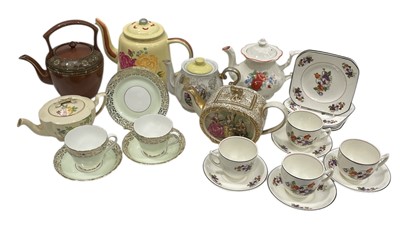 Lot 89 - A selection of Five Teapots (one musical), an...