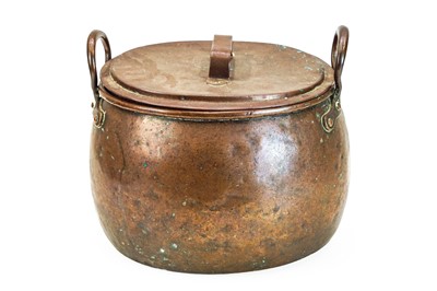 Lot 136 - A copper cooking pot and cover.