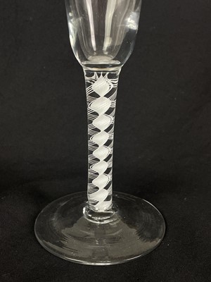Lot 544 - A George III glass ale flute.
