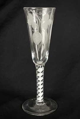 Lot 544 - A George III glass ale flute.