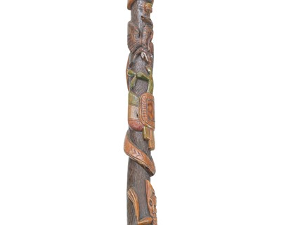 Lot 4 - A 20th century Mexican carved hardwood walking stick.