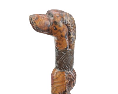 Lot 4 - A 20th century Mexican carved hardwood walking stick.